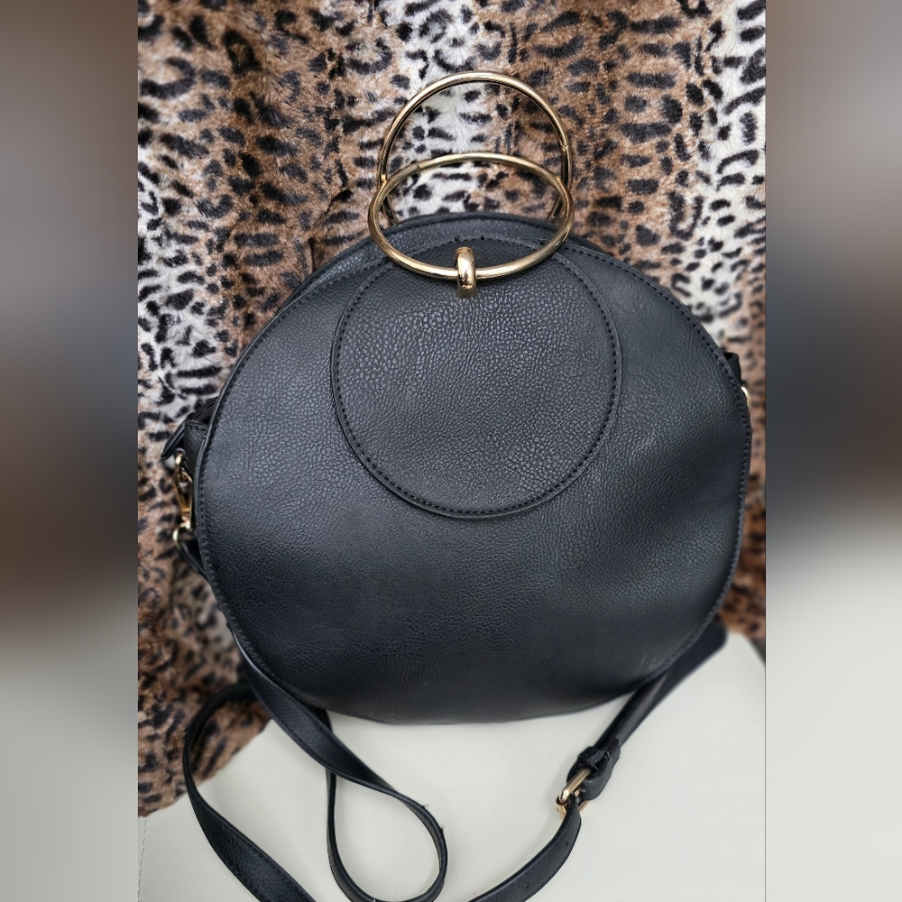 Black and Gold Crossbody Bag with Structured Design